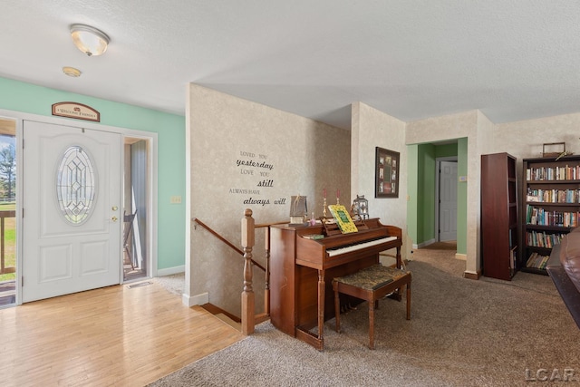 3620 Sharp Rd, Adrian, MI 49221 - dining room with baseboards, wood finished floors, a textured ceiling, and visible vents