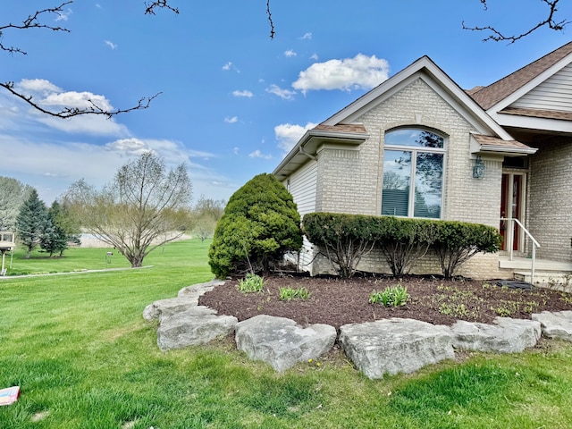 8505 Woodridge Dr, Davison, MI 48423 - view of home's exterior with a yard and brick siding