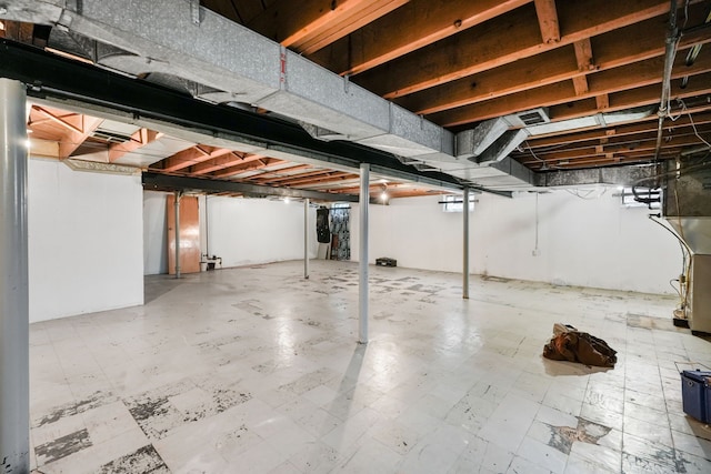 unfinished basement with tile patterned floors