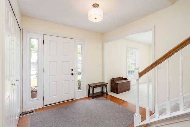 44492 Midway Dr, Novi, MI 48375 - foyer entrance with stairway and wood finished floors