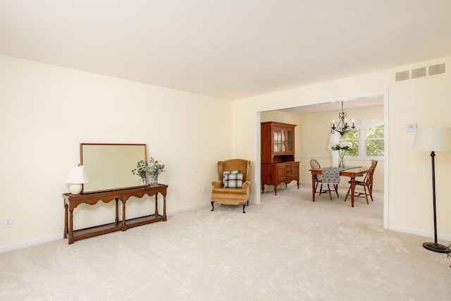 44492 Midway Dr, Novi, MI 48375 - living area featuring a chandelier, light colored carpet, and baseboards