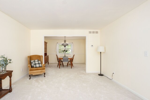 44492 Midway Dr, Novi, MI 48375 - living area featuring a chandelier, light colored carpet, and baseboards