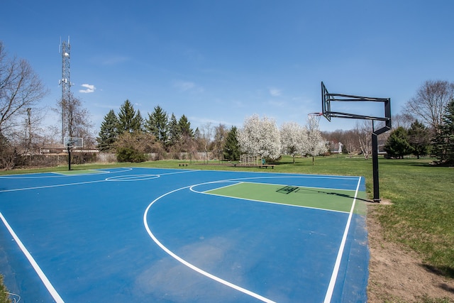 view of sport court featuring a lawn and community basketball court