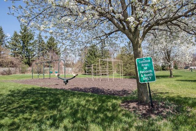 surrounding community featuring a yard and playground community