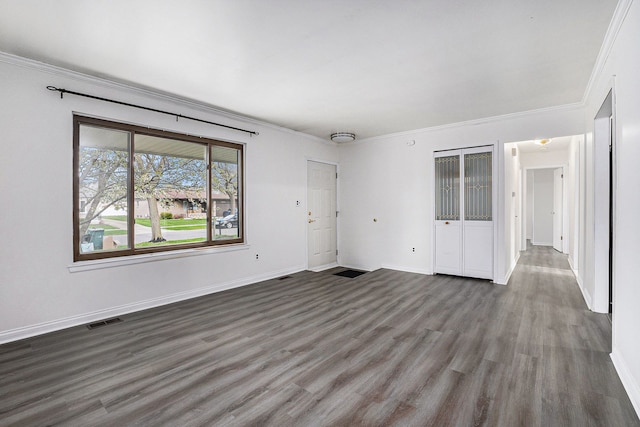3410 Pasadena Dr, Troy, MI 48083 - interior space featuring crown molding, visible vents, and dark wood finished floors