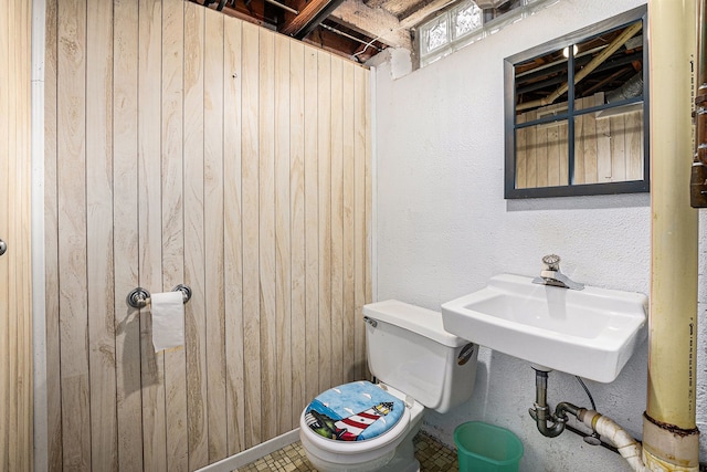 3410 Pasadena Dr, Troy, MI 48083 - half bath with a sink, wood walls, and toilet