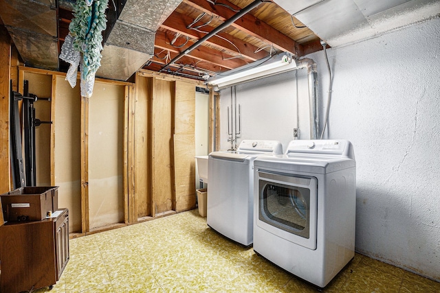 3410 Pasadena Dr, Troy, MI 48083 - clothes washing area featuring laundry area, washer and clothes dryer, and tile patterned floors