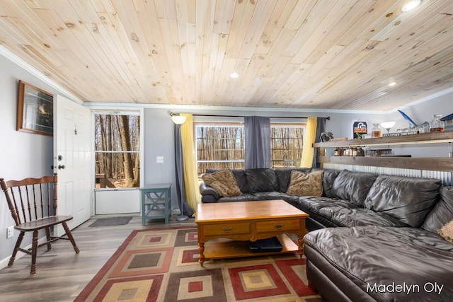 living area featuring wooden ceiling, ornamental molding, wood finished floors, and recessed lighting