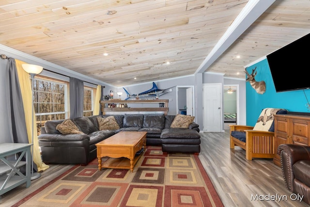 living room featuring lofted ceiling, wood finished floors, ornamental molding, and wooden ceiling