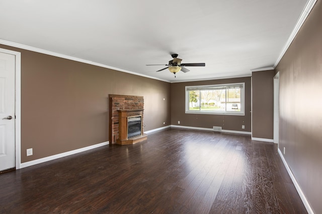 unfurnished living room with visible vents, baseboards, ornamental molding, dark wood finished floors, and a ceiling fan