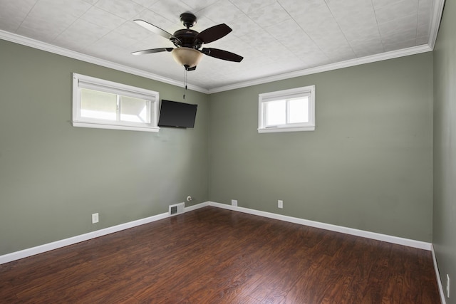 unfurnished room featuring dark wood-style flooring, visible vents, ceiling fan, and baseboards