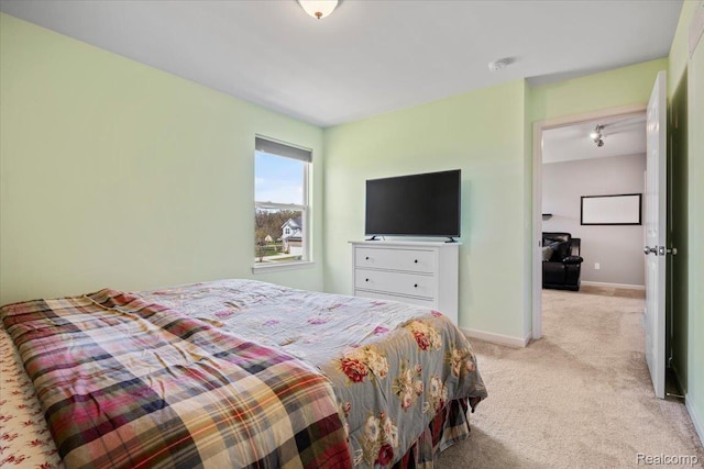 822 Balsam Cir, Rochester, MI 48307 - bedroom with light carpet and baseboards