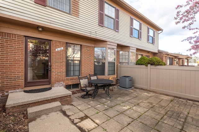 31198 Country Way Unit 27, Farmington Hills, MI 48331 - view of patio with central AC unit and fence
