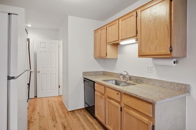 31198 Country Way Unit 27, Farmington Hills, MI 48331 - kitchen featuring a sink, black dishwasher, light wood-type flooring, light brown cabinetry, and freestanding refrigerator