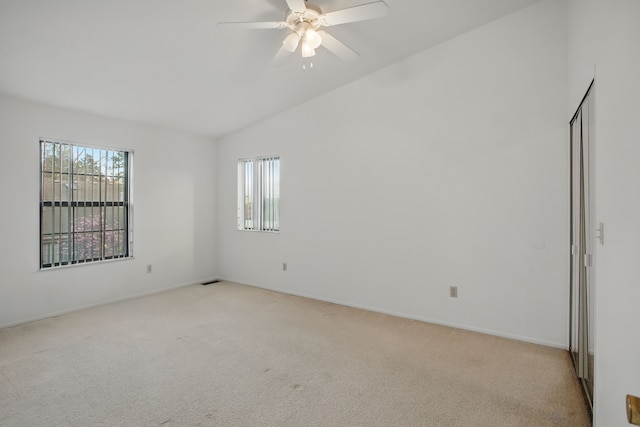 31198 Country Way Unit 27, Farmington Hills, MI 48331 - unfurnished room with baseboards, ceiling fan, light colored carpet, and vaulted ceiling