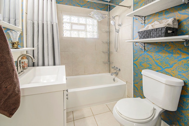 full bathroom featuring a sink, tile patterned floors, shower / bath combo, and toilet