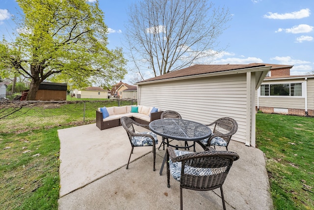 view of patio / terrace with outdoor lounge area and fence