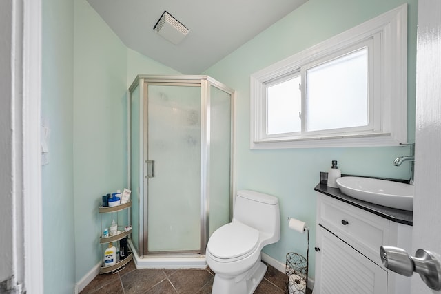 bathroom with visible vents, a shower stall, toilet, and vanity