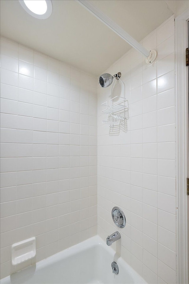 full bath featuring shower / bathtub combination