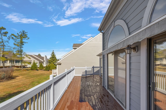wooden deck with a residential view
