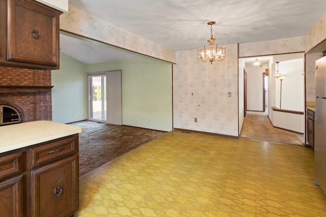 15895 Bexley St, Clinton Township, MI 48038 - interior space with baseboards, a notable chandelier, wallpapered walls, and light floors
