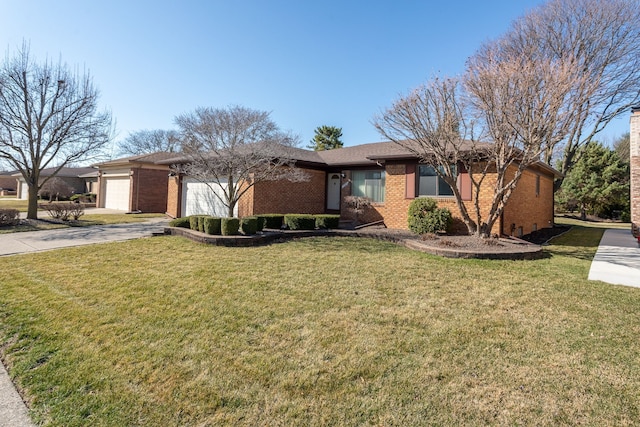 15895 Bexley St, Clinton Township, MI 48038 - ranch-style house featuring a front lawn, concrete driveway, brick siding, and an attached garage