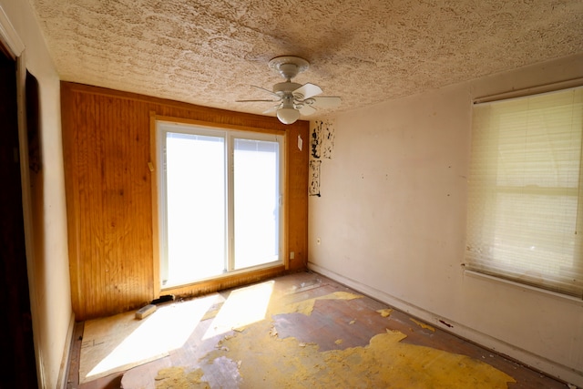 spare room with ceiling fan