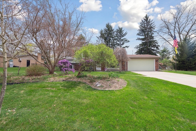 view of front of property with concrete driveway, brick siding, an attached garage, and a front yard
