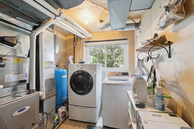 laundry area featuring laundry area and washing machine and dryer