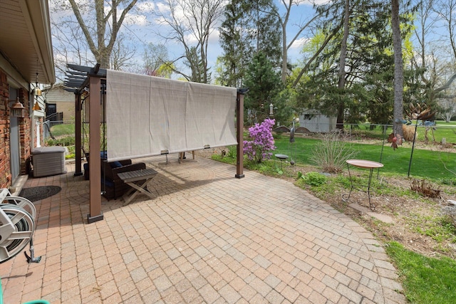 view of patio / terrace featuring fence