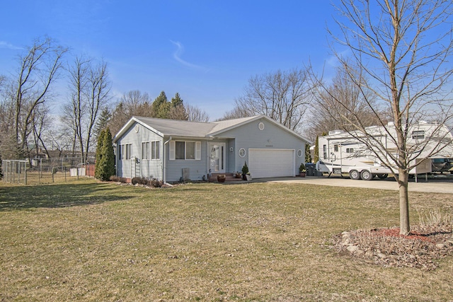 single story home featuring a garage, fence, a front lawn, and concrete driveway