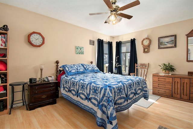bedroom featuring wood finished floors and ceiling fan