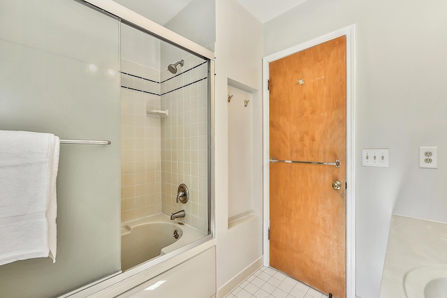 bathroom featuring tile patterned flooring and tub / shower combination