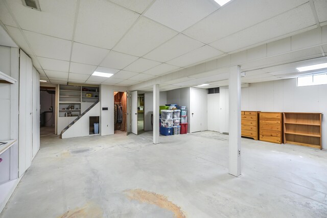 below grade area with visible vents and a paneled ceiling