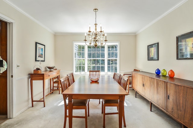 dining area with crown molding, light colored carpet, and a chandelier