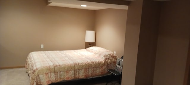 bedroom featuring carpet