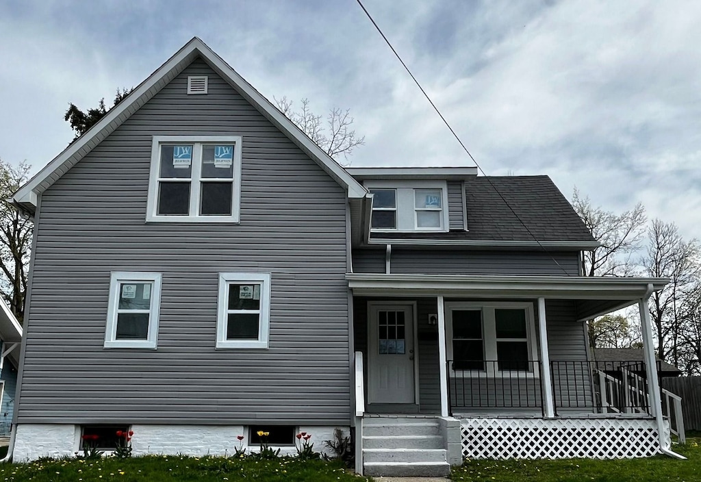 417 E Hunt St, Adrian, MI 49221 - view of front of house featuring a porch
