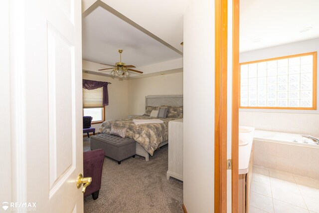 7077 Crosswinds Dr, Swartz Creek, MI 48473 - carpeted bedroom with ceiling fan