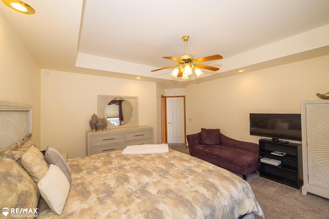 7077 Crosswinds Dr, Swartz Creek, MI 48473 - bedroom featuring recessed lighting, a raised ceiling, ceiling fan, and carpet floors