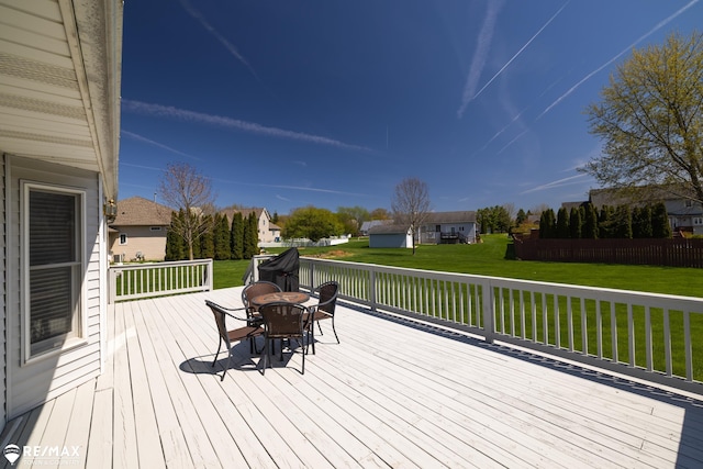 7077 Crosswinds Dr, Swartz Creek, MI 48473 - deck featuring a residential view, outdoor dining area, and a yard