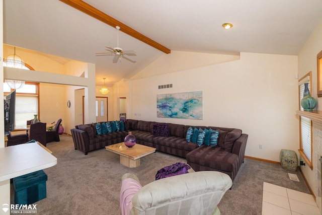 7077 Crosswinds Dr, Swartz Creek, MI 48473 - carpeted living area featuring visible vents, baseboards, beam ceiling, a ceiling fan, and high vaulted ceiling