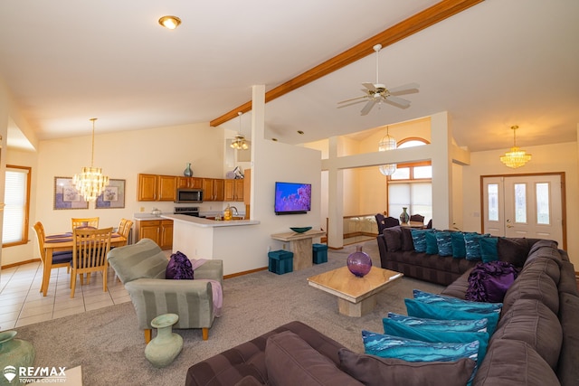 7077 Crosswinds Dr, Swartz Creek, MI 48473 - living area with light colored carpet, lofted ceiling with beams, plenty of natural light, and baseboards