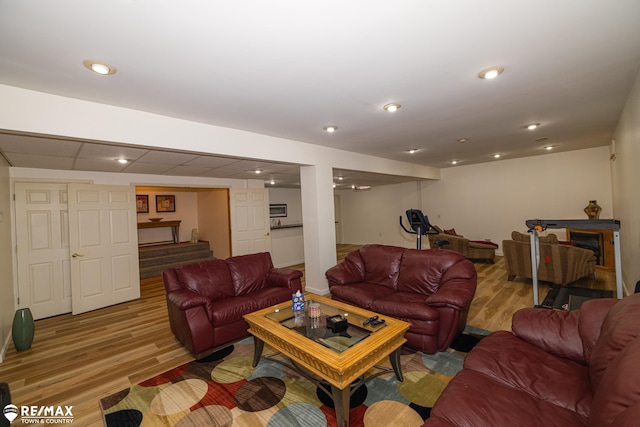 7077 Crosswinds Dr, Swartz Creek, MI 48473 - living area with baseboards and wood finished floors