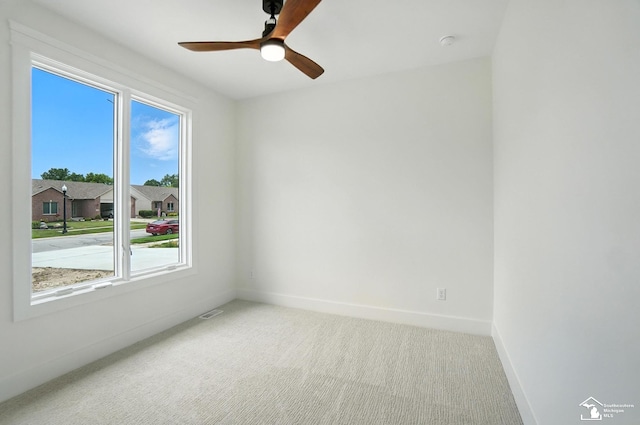 552 Central Park Blvd, Monroe, MI 48162 - empty room featuring carpet flooring, a ceiling fan, and a smoke detector