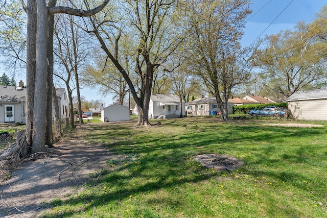 view of yard featuring a residential view