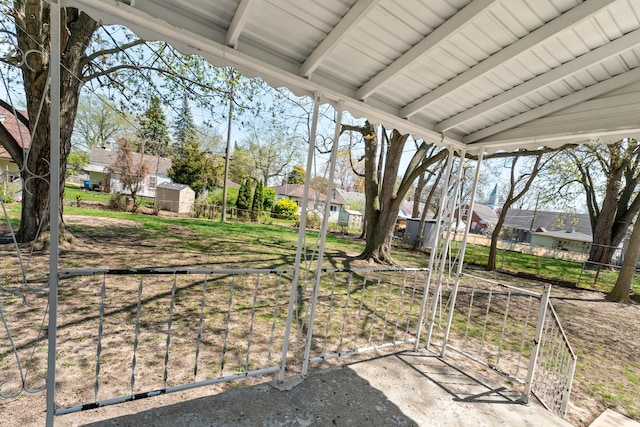 view of yard with fence and a residential view