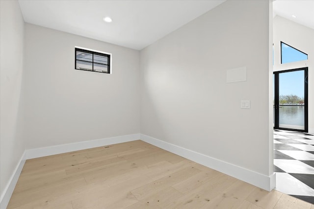 13459 Haddon St, Fenton, MI 48430 - empty room with baseboards, recessed lighting, and light wood finished floors