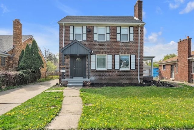 8790 E Outer Dr, Detroit, MI 48213 - view of front of property featuring brick siding and a front lawn