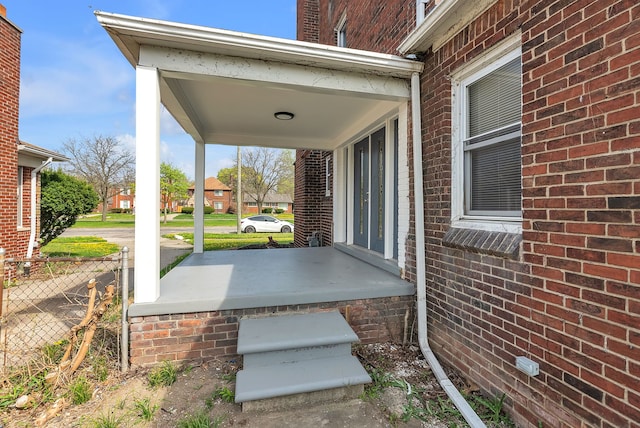 8790 E Outer Dr, Detroit, MI 48213 - view of patio / terrace featuring covered porch and fence