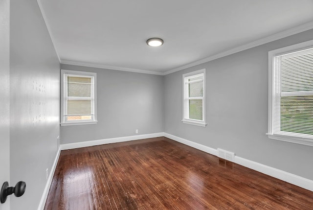 8790 E Outer Dr, Detroit, MI 48213 - empty room featuring ornamental molding, a healthy amount of sunlight, and baseboards